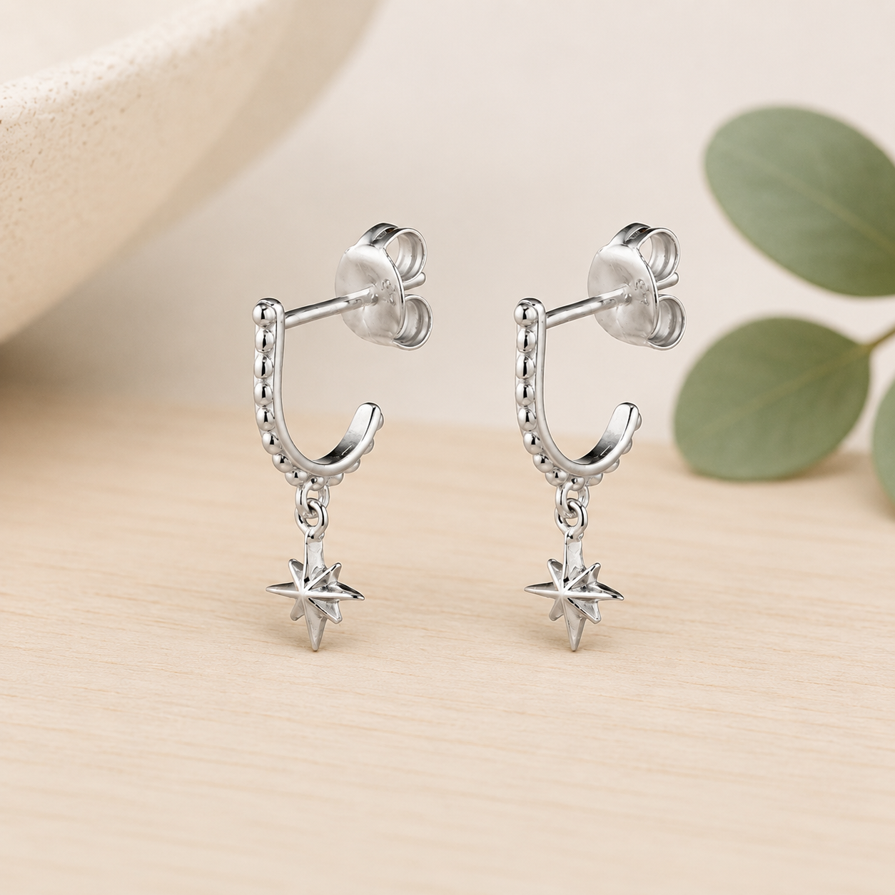 Sterling Silver North Star Huggie Earrings