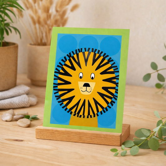 Lion blank greeting card with bright blue background and green border